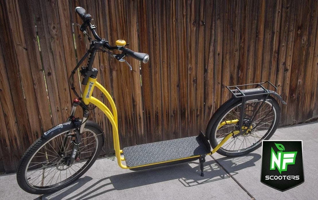Yellow NF scooter from 2017 with a rear rack